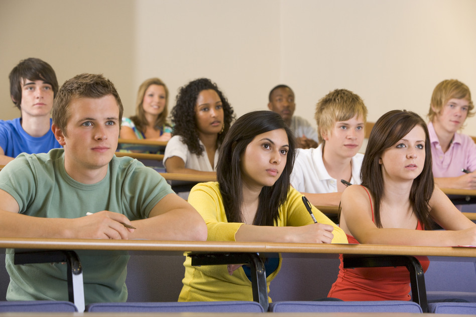 photodune-312480-college-students-listening-to-a-university-lecture-s